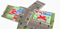 Maquette orbitale 3D d'un programme de logements, lots rep&eacute;r&eacute;s par couleur